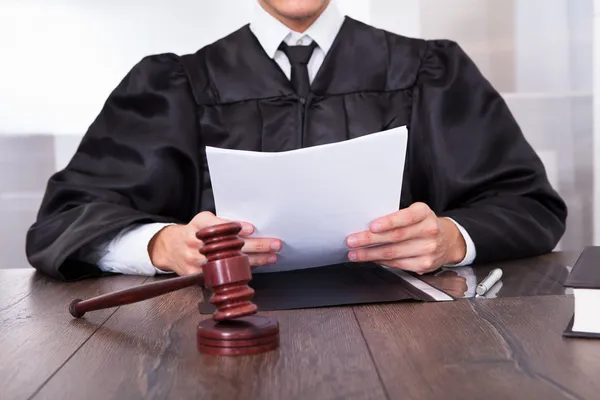 Judge Holding Documents — Stock Photo, Image