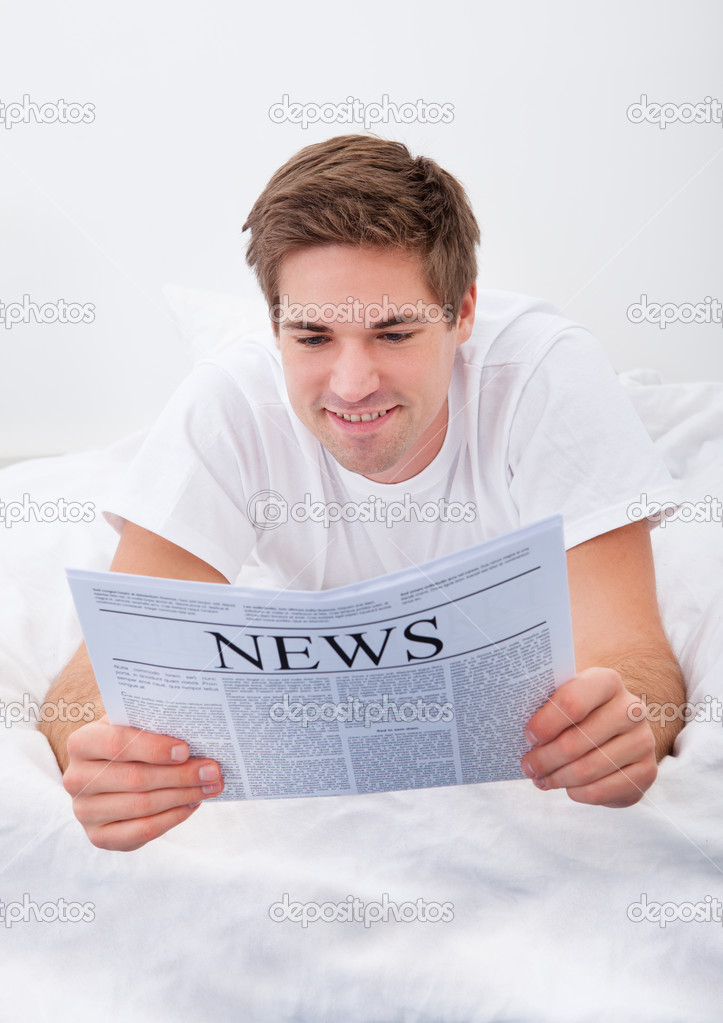 Man Reading Newspaper