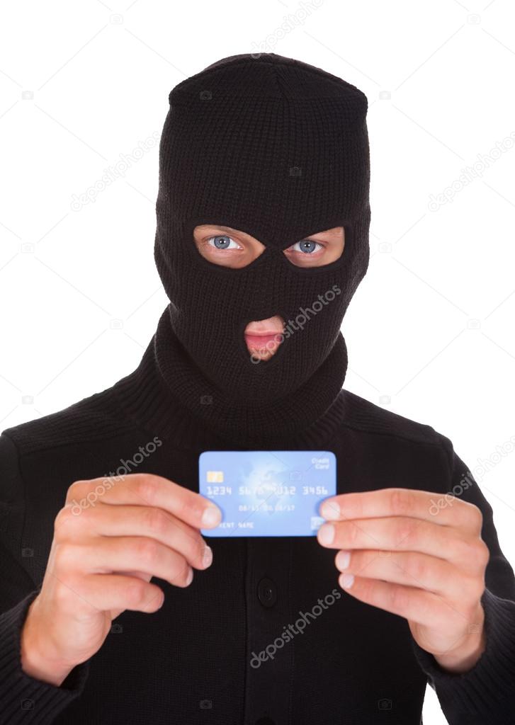 Burglar Holding Credit Card