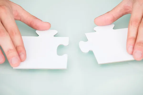 Businessman Solving Jigsaw Puzzle — Stock Photo, Image