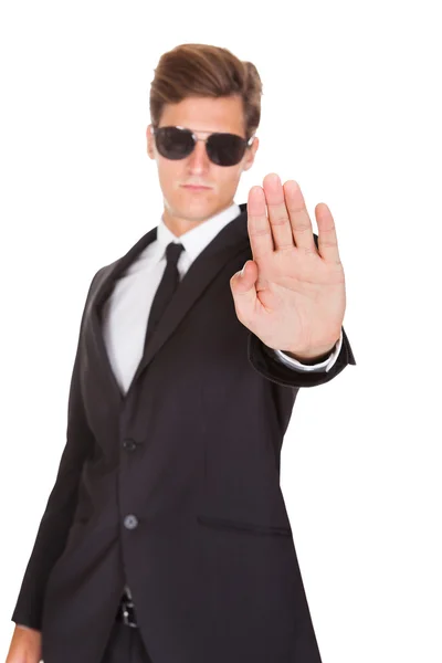 Male Spy Showing Stop Sign — Stock Photo, Image