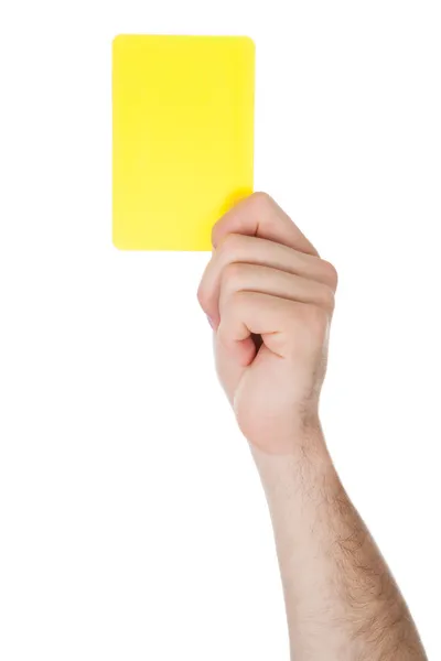 Mano mostrando cartellino giallo — Foto Stock