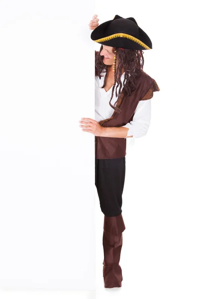 Young Pirate Pointing At Blank Placard — Stock Photo, Image