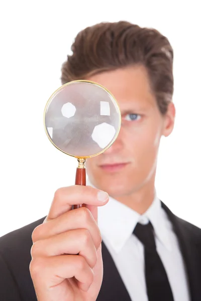 Man Holding Magnifying Glass — Stock Photo, Image