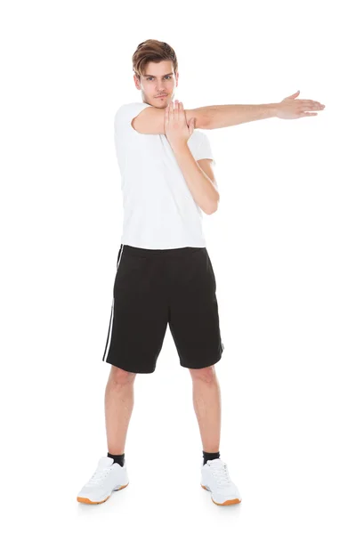 Young Man Stretching — Stock Photo, Image