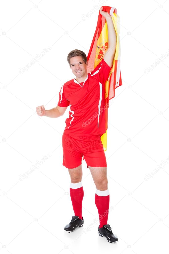 Soccer Player Holding Spanish Flag