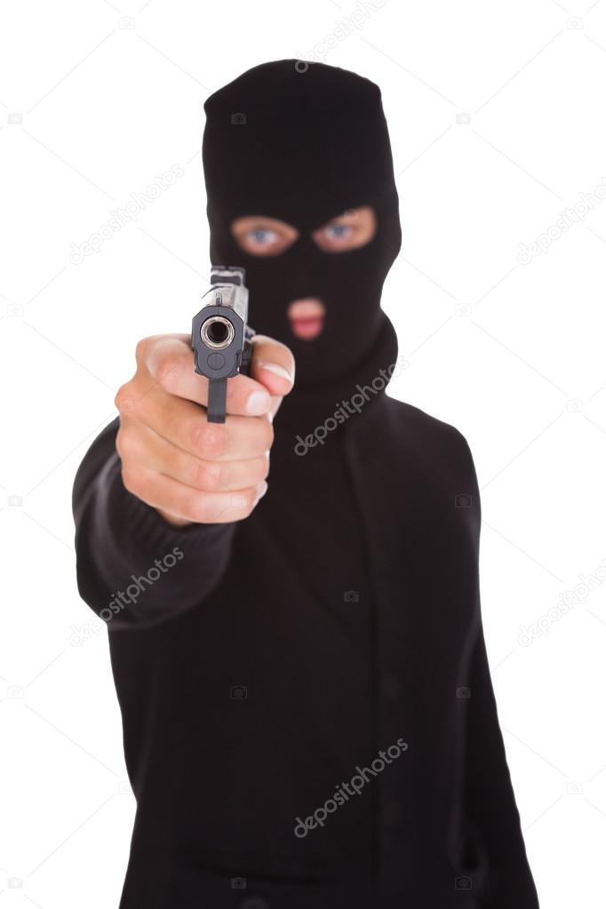 Burglar Holding Hand Gun