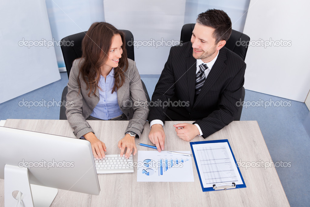 Businesspeople Working At Office