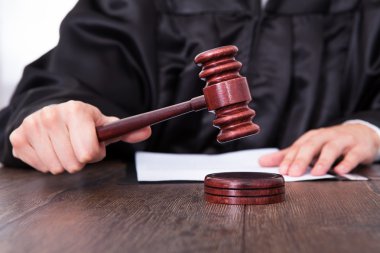 Judge Holding Mallet clipart