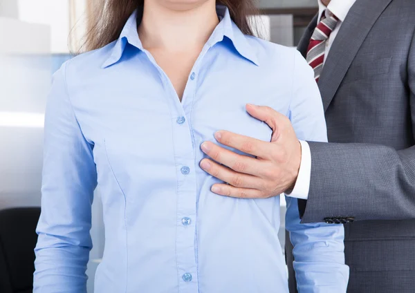 Businessman Touching Businesswoman — Stock Photo, Image