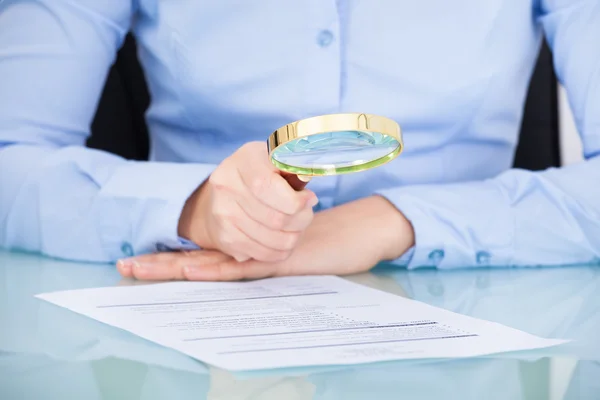 Businesswoman Holding Magnifying Glass — Stock Photo, Image