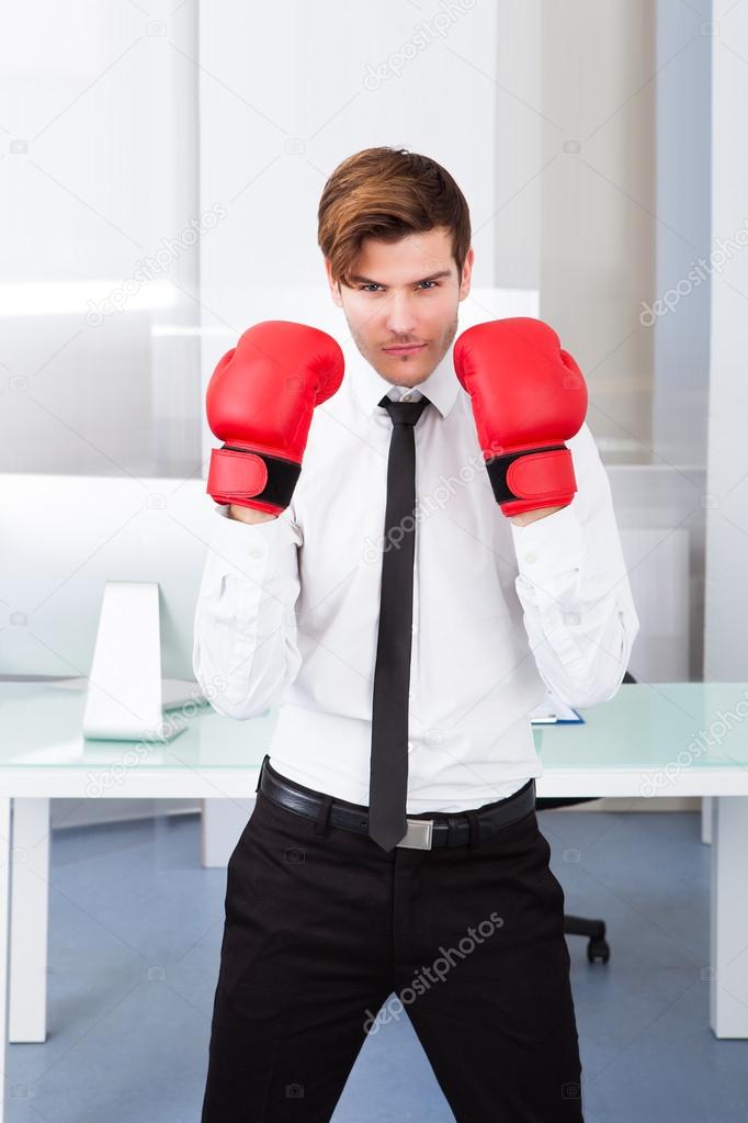 Businessman Wearing Boxing Gloves
