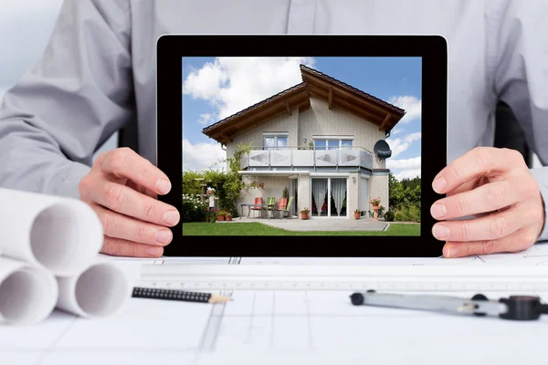 Architect Showing Picture Of House — Stock Photo, Image