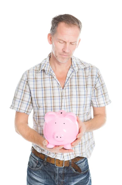 Man Holding Piggybank — Stock Photo, Image