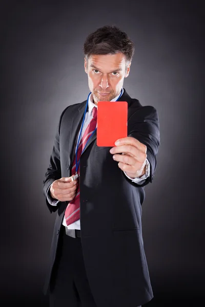 Businessman Showing Red Card — Stock Photo, Image