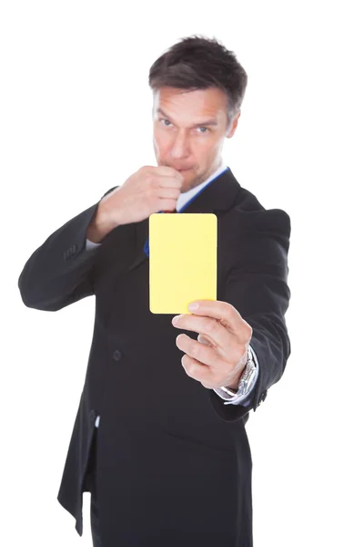 Businessman Showing Yellow Card — Stock Photo, Image