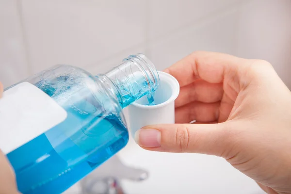 Person Pouring Liquid In Container — Stock Photo, Image