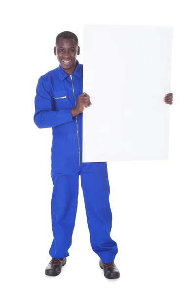 Lavoratore maschio con cartellone — Foto Stock