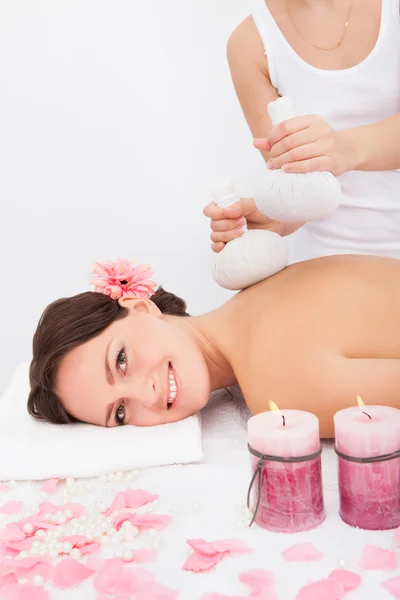 Woman Getting Herbal Compress Ball Therapy — Stock Photo, Image