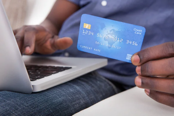 Hand With Laptop And Credit Card — Stock Photo, Image