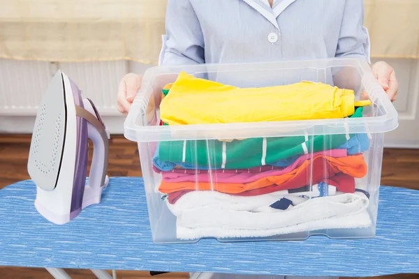 Maid Holding Laundry Basket — Stock Photo, Image