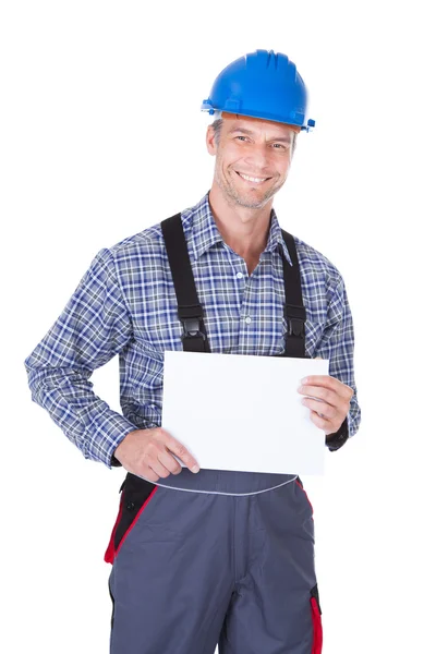 Male Worker With Blank Placard Royalty Free Stock Photos