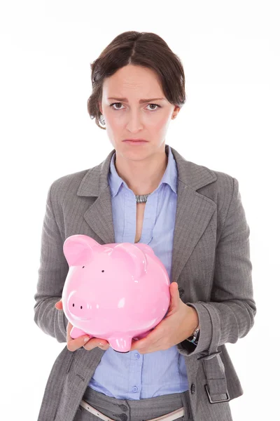 Sad Businesswoman Holding Piggybank Stock Photo