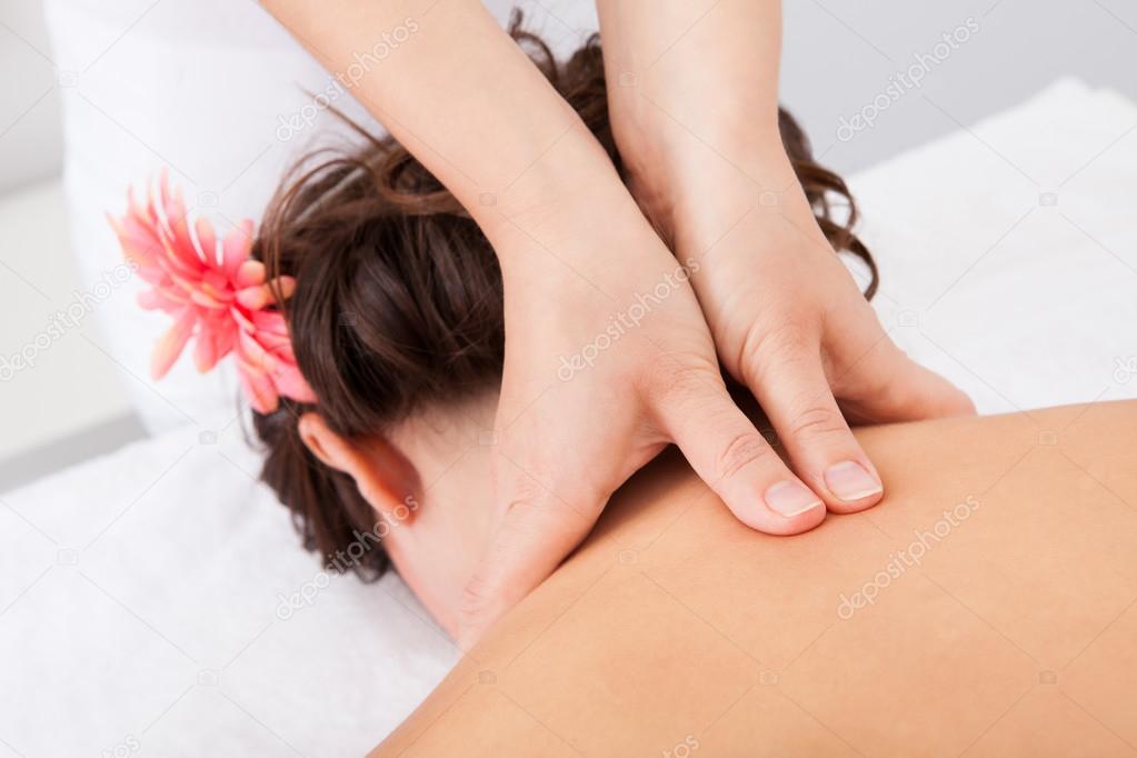 Woman Getting Treatment For Her Neck
