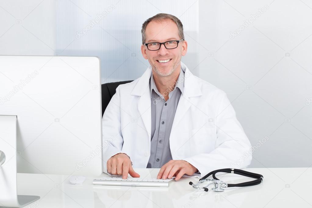 Doctor Using Computer