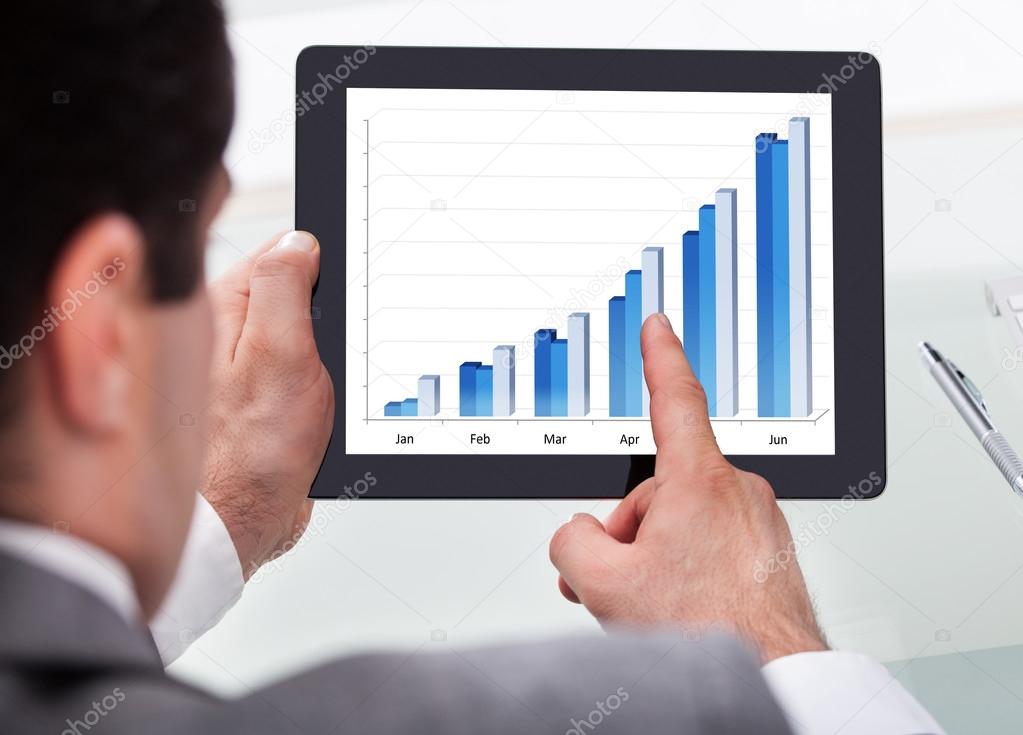 Businessman Analyzing Graph