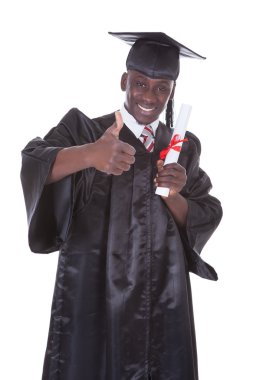 Genç mezuniyet man holding diploma