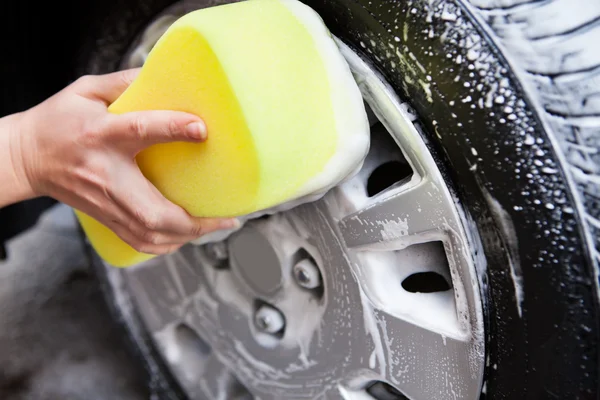 Hand Washing A Tire With Sponge — Stock Photo, Image