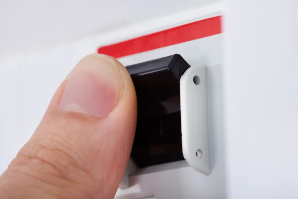 Human Hand On Distribution Board — Stock Photo, Image