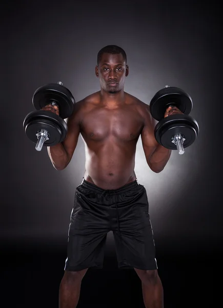 Young African Man Working Out With Dumbbells — Stock Photo, Image