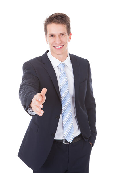 Portrait Of A Businessman Offering Handshake
