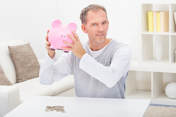 Man Holding Piggybank — Stock Photo, Image