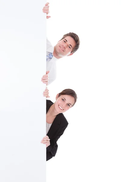 Businesswoman And Businessman Holding Placard — Stock Photo, Image