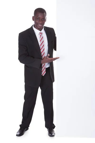 African Businessman Holding Placard — Stock Photo, Image