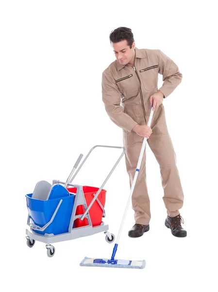 Mężczyzna zamiatacz czyszczenia podłogi — Zdjęcie stockowe