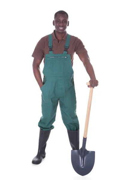 Садовник с лопатой — стоковое фото