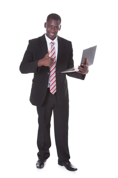 Businessman Holding Laptop — Stock Photo, Image