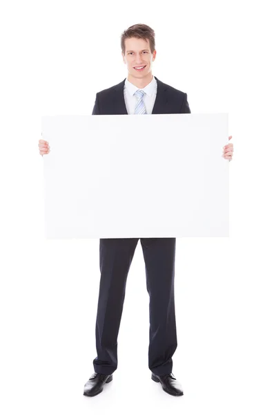 Businessman Holding Placard Stock Image