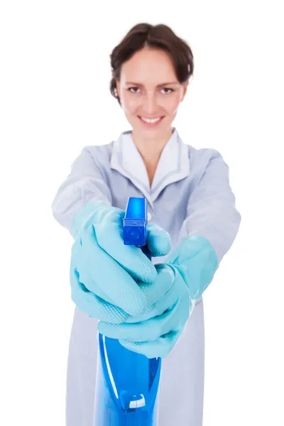 Woman Spraying Cleaning Liquid Royalty Free Stock Images