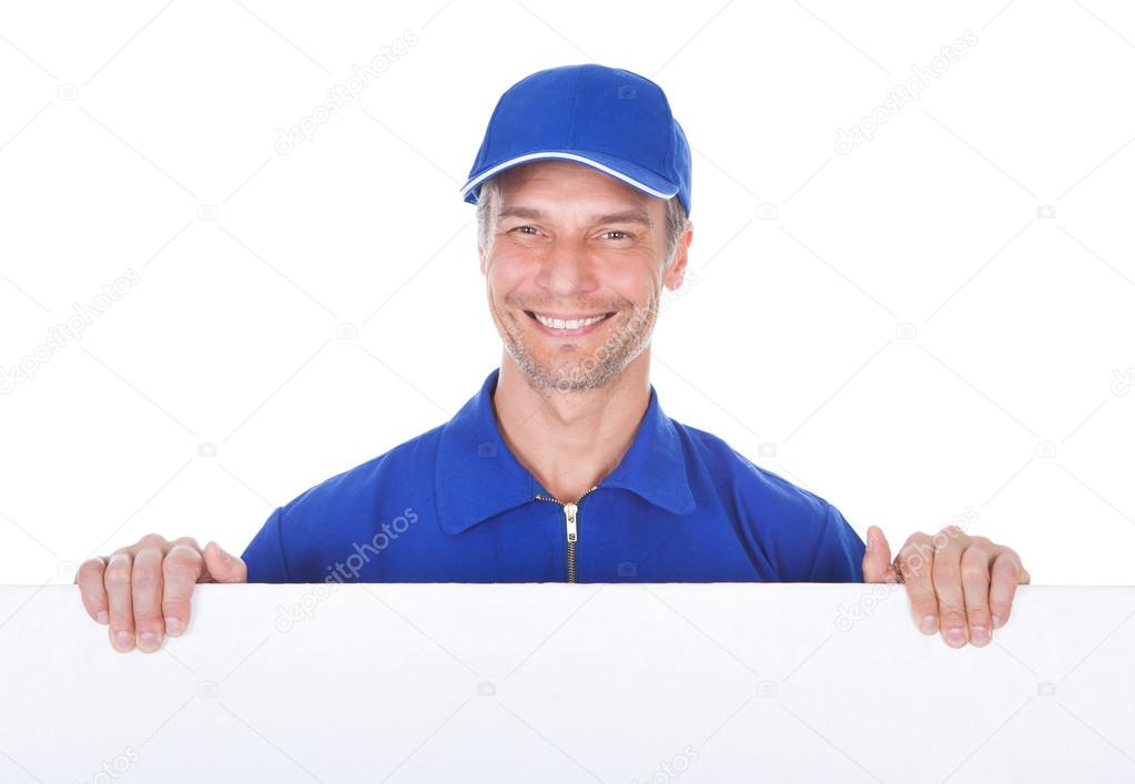 Male Worker Holding Blank Placard