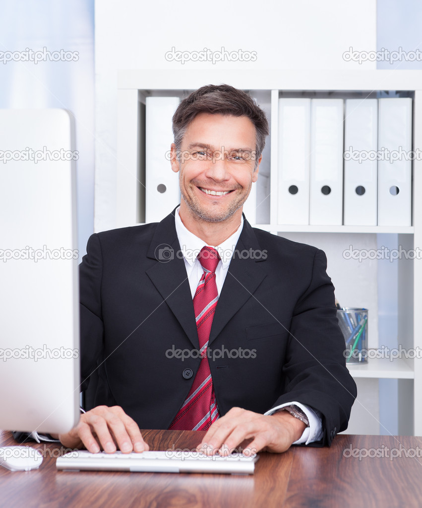 Businessman Using Computer