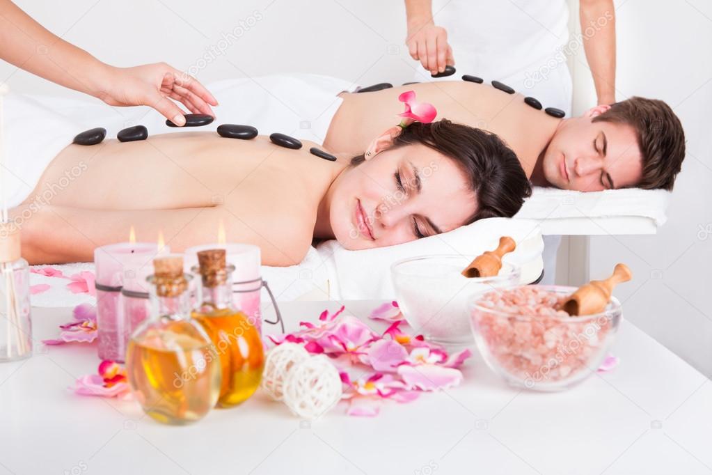 Couple Having A Stone Massage