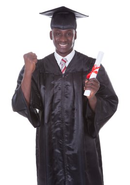 Genç mezuniyet man holding diploma
