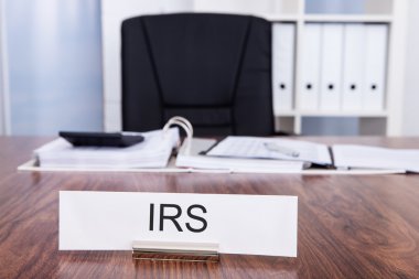 Irs Nameplate In Office clipart