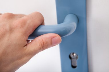 Hand Opening The Door Handle clipart