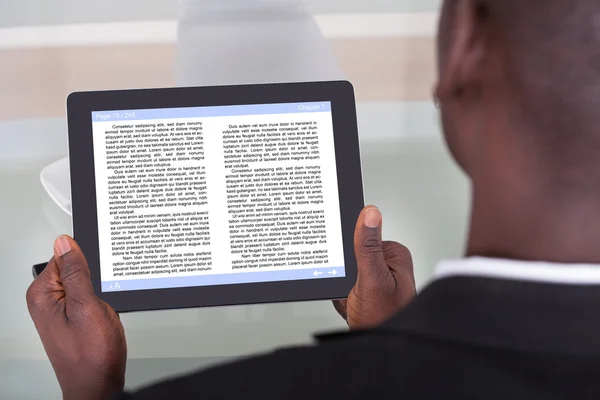 Businessman Reading E-book — Stock Photo, Image